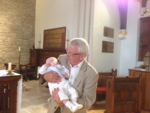 Elijah at his baptism, with a proud grandad 