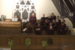 The choir sing the closing hymn