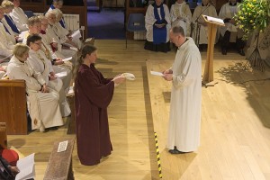 Rhiannon Miller presents Graham with a stole