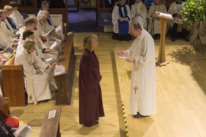 Sarah Axford presents Graham with oil