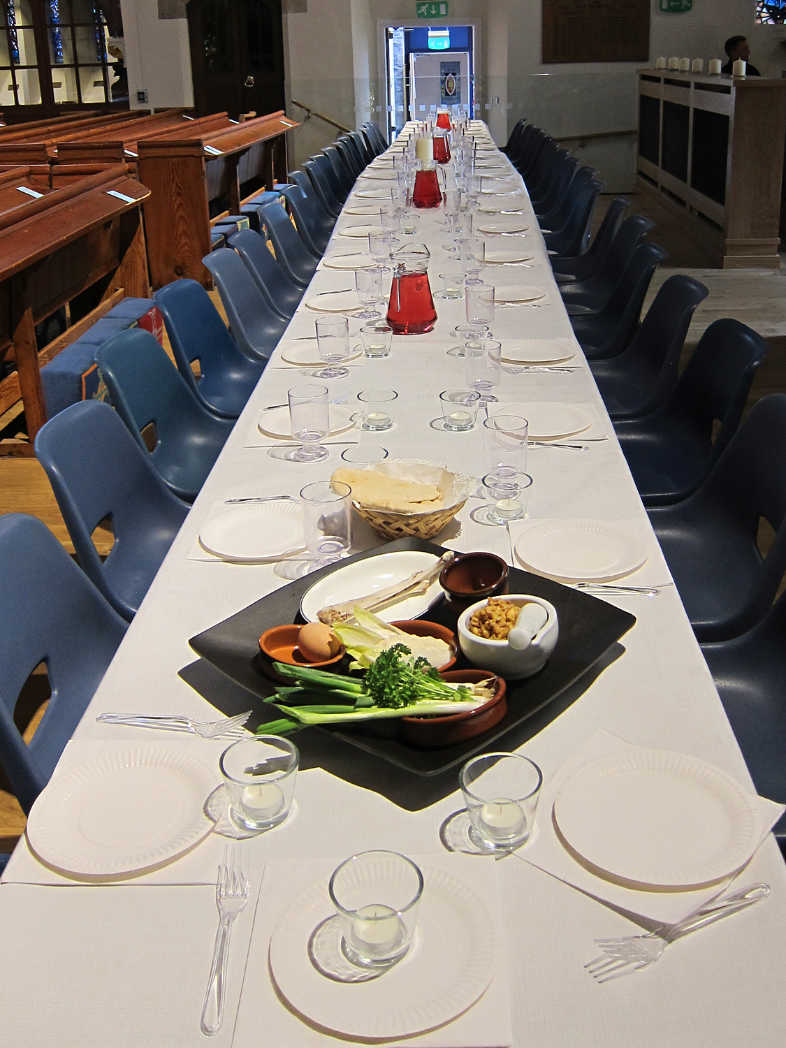 The table in church prepared for the Seder meal