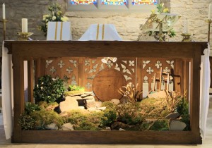The garden scene under the altar - Cross and tomb